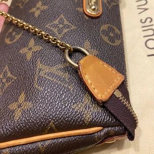 Louis Vuitton eva clutch cross body bag